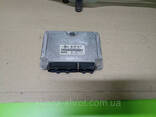 Блок управления двигателем 2.0 бензин 06A906018FK - фото 2