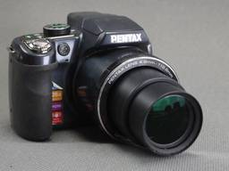 Цифровой фотоаппарат Pentax X90 12.10Mpix Pentax SMC 4,6-119,6mm 26x Zoom lens Вживане