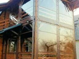 Гибкие окна для веранды из деревянного бруса