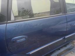 Киа каренс 2002-2006 двери, ляда решетка , cиденья торпеда и тд