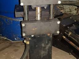 Подавальний пристрій (подача кліщова) для автоматичної подачі штрипсу в зону штампування