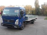 Новый бортовой грузовик Hyundai EX8 - фото 1