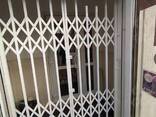 Монтаж і виготовлення на вікна та двері в офіс, будинок, магазин розсувних решіток від. .. - фото 3