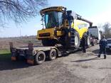 Перевозка комбайна New Holland TС5080 с жатками до 9 метров включительно. Заказать трал - фото 1
