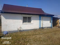 Продам дом в Чепилиевке.25 соток. Газ, свет, вода.