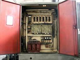 Продам токарный патронно-центровой полуавтомат с ЧПУ 1П752