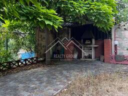 Продаж двоповерхового будинку з басейном та гаражем біля річки в Мар’янівці