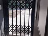 Розсувні решітки металеві на двері, вікна вітрини Виробництво і установка по Україні - фото 16