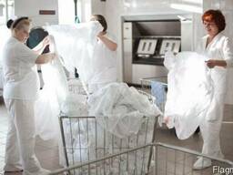 Стрика и прачка медицинской спеодежды