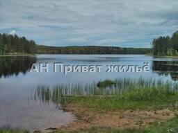 Земельный участок возле водоема для дачного дома.