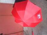 Зонт красного цвета от дождя и солнца